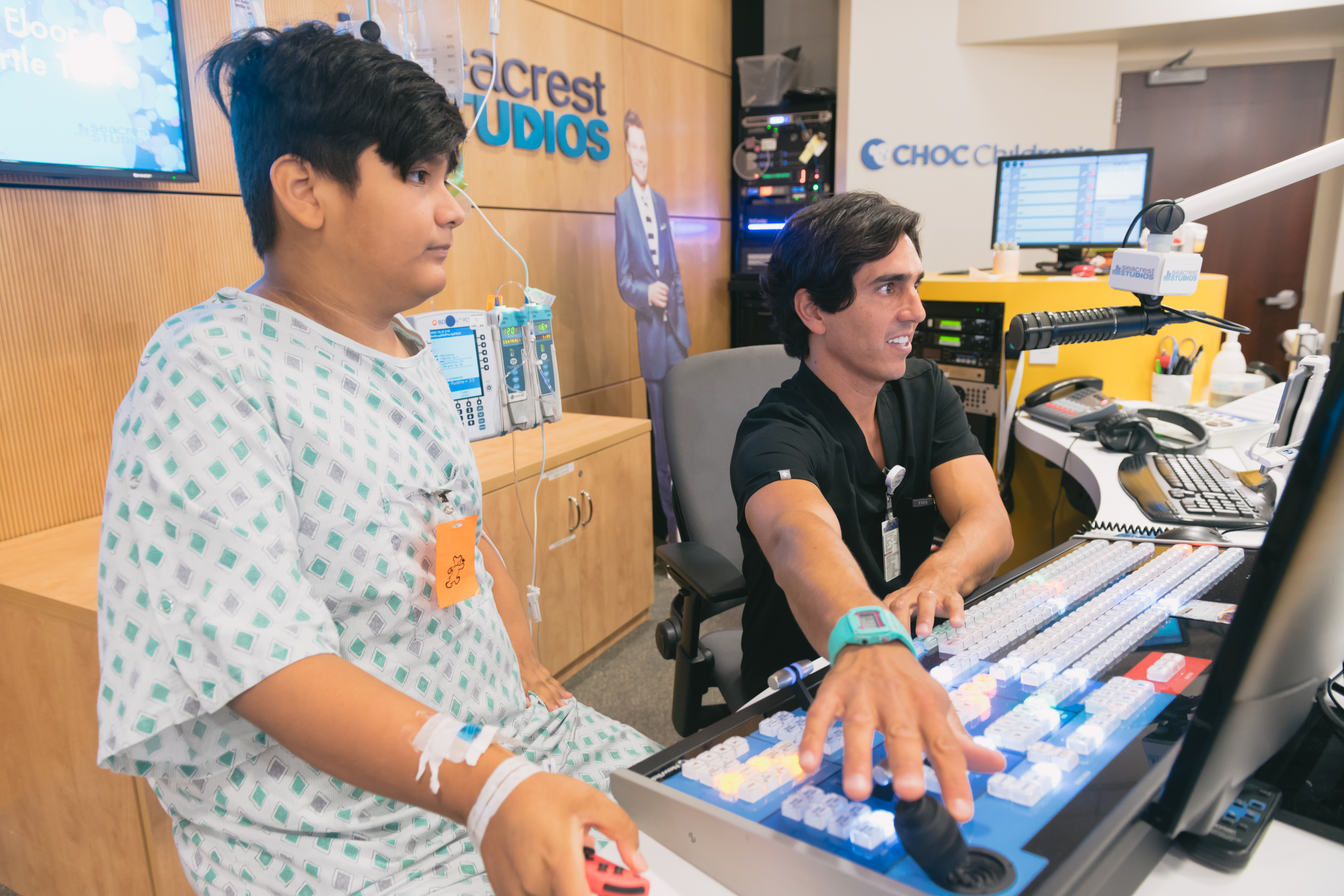 Patient interacting with Seacrest Studios, CHOC's in-house multimedia broadcast center