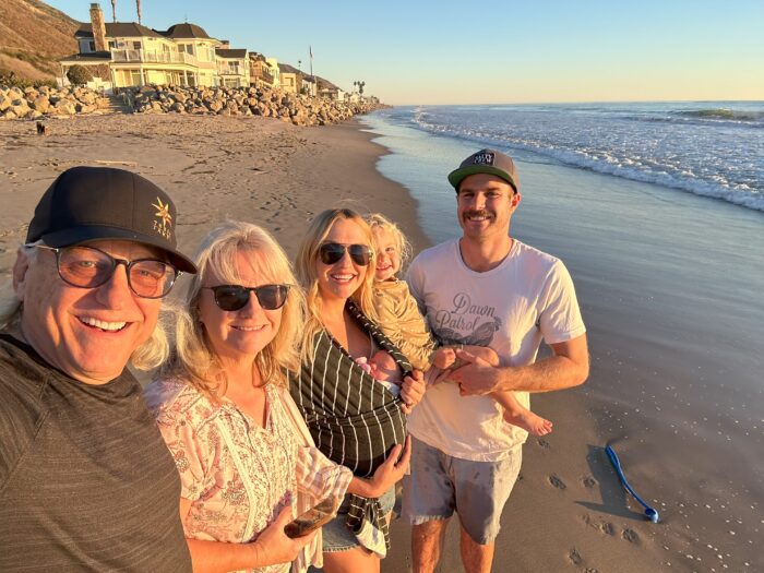 The Jewell family portrait at the beach. Pictured are David and Beth Jewell, Katrina, and her husband Jake with their daughter