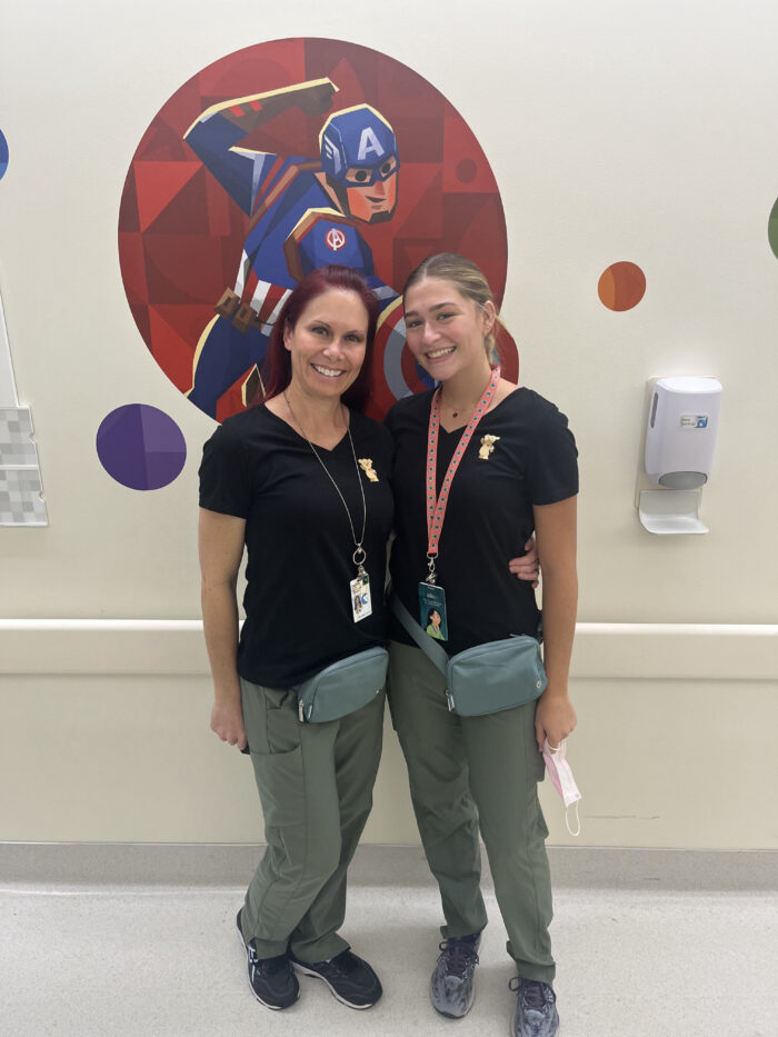 Meaghen Reahm pictured with her daughter, Erika Hertz, in matching nurse uniforms at CHOC.
