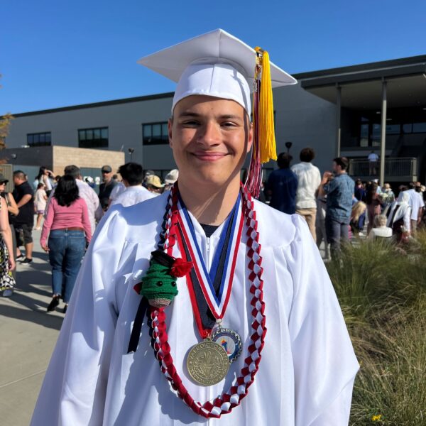 Grateful CHOC patient Carson in his graduation regalia