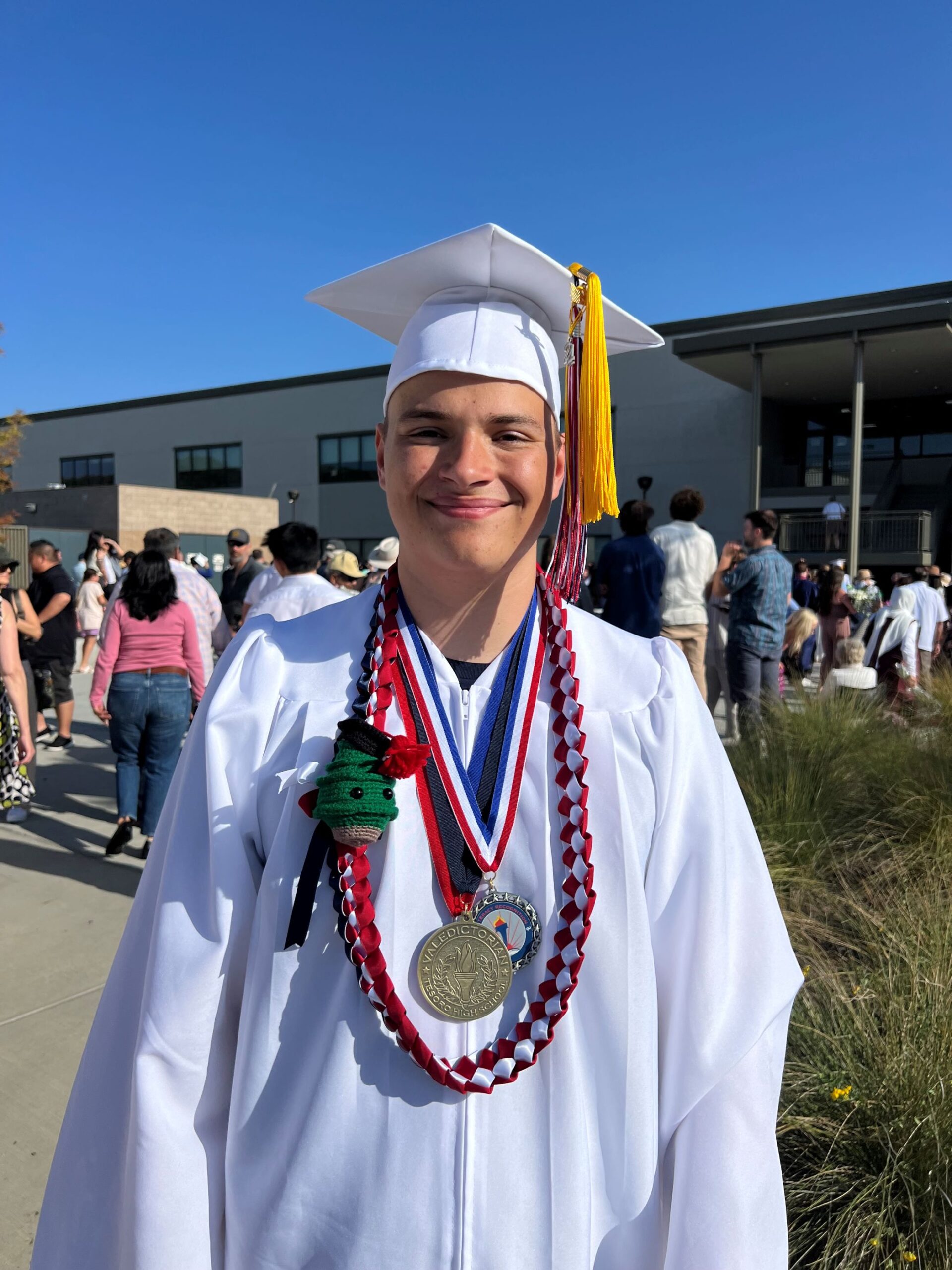 Grateful CHOC patient Carson in his graduation regalia