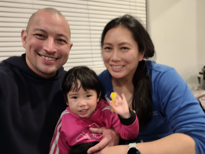 Kali and her parents, Jemma and Adam.