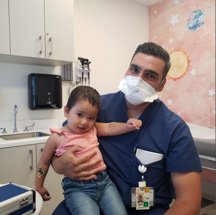 Kali with Rady Children’s neurosurgeon Dr. Joffre E. Olaya